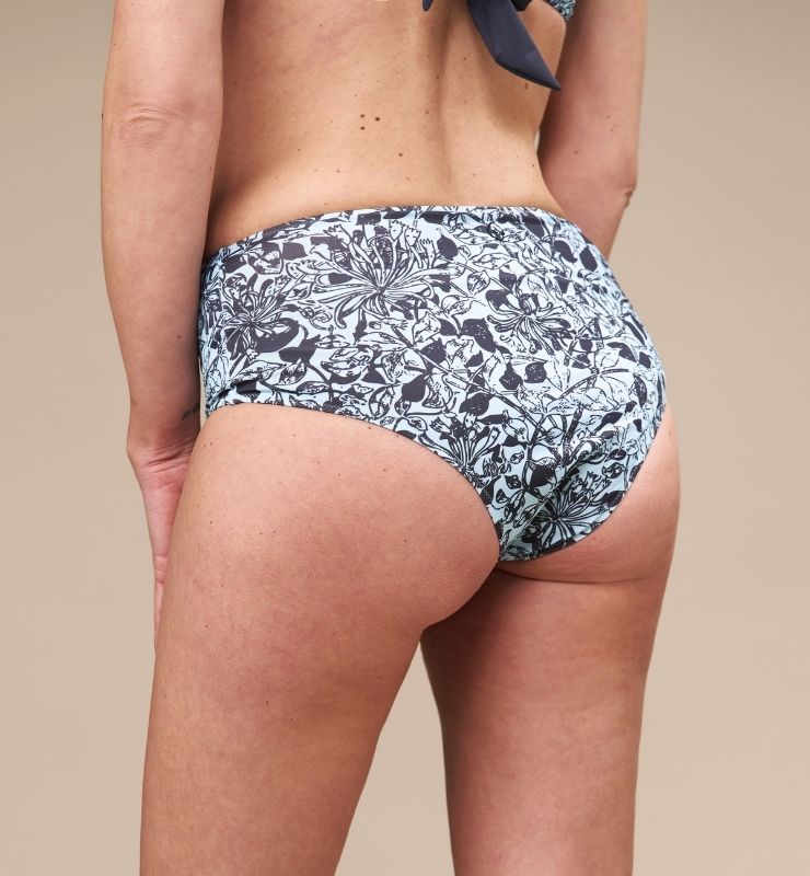High-waisted eco bikini briefs with flower pattern in ECONYL® regenerated nylon